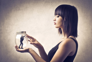 bigstock-Woman-holding-a-pot-with-impri-30061961